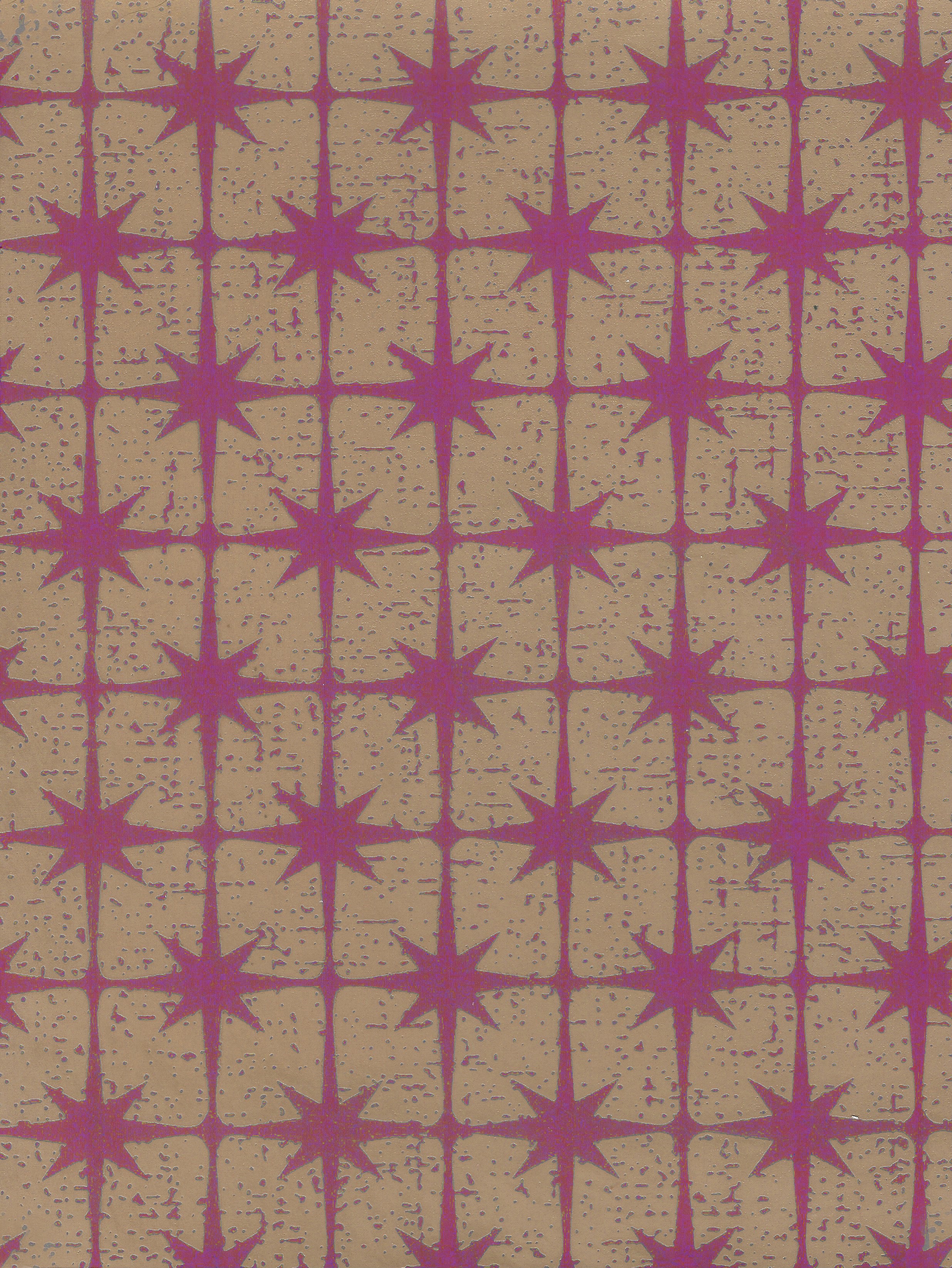 Detail of wallpaper in a geometric damask print in fuchsia on a gold field.