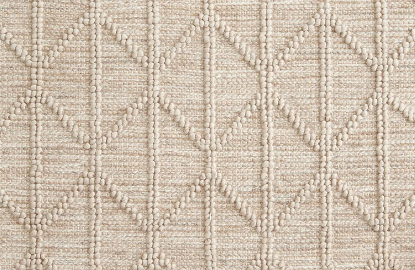 Broadloom carpet swatch in a diamond textured pattern in a cream design