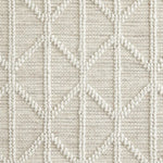 Broadloom carpet swatch in a diamond textured pattern in a white design