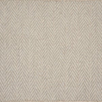 Broadloom carpet in a herringbone pattern in soft beige.