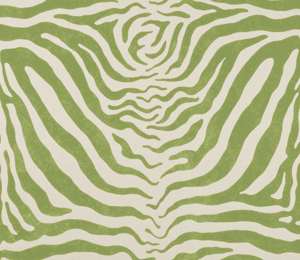 Detail of fabric in a zebra print in green on a cream field.