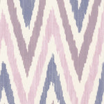 Detail of wallpaper in a geometric ikat print in shades of purple and blue on a white field.