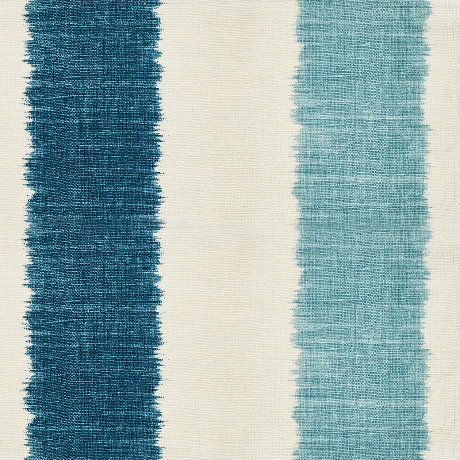 Detail of fabric in an ikat stripe print in shades of blue on a cream field.