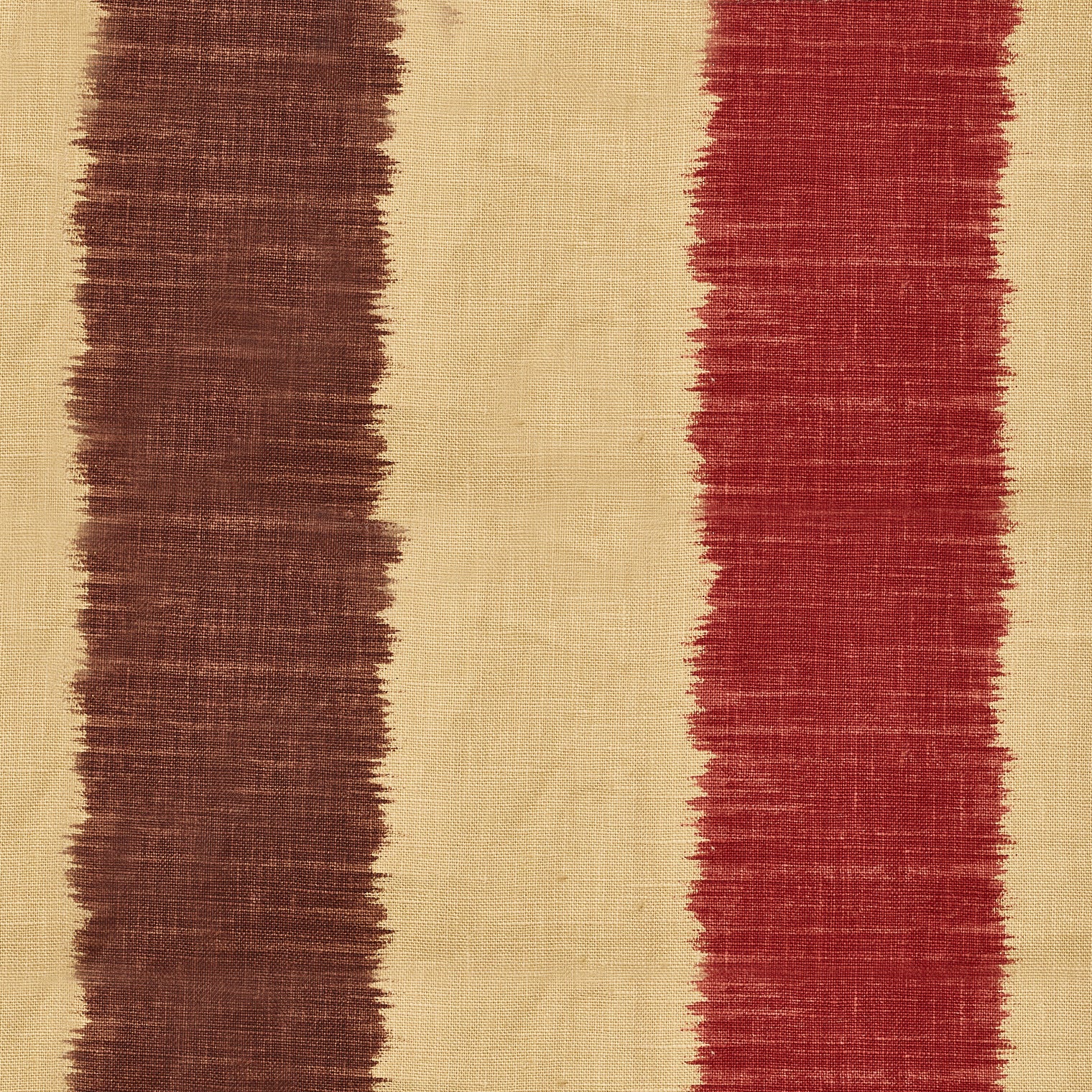 Detail of fabric in an ikat stripe print in shades of brown and rust on a tan field.