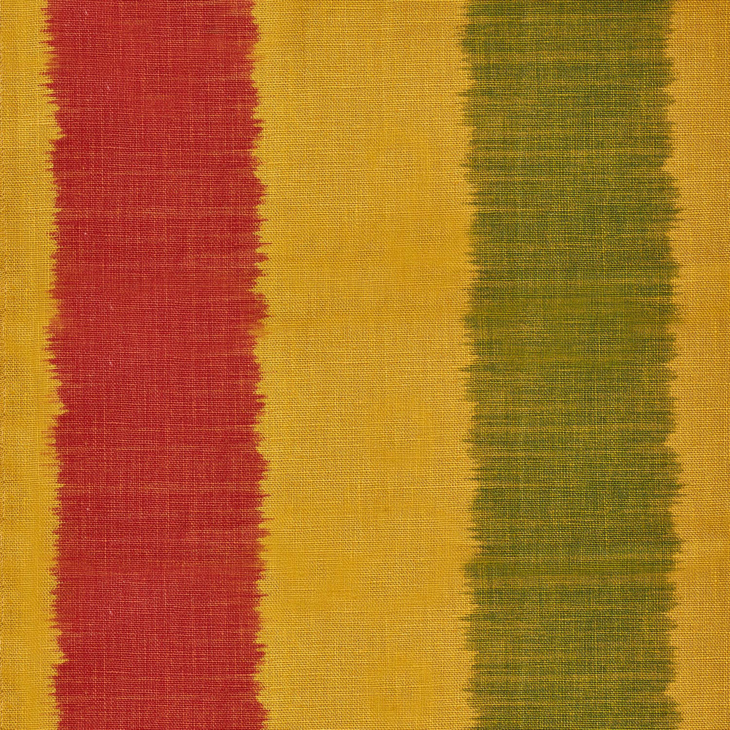 Detail of fabric in an ikat stripe print in shades of red and green on a yellow field.