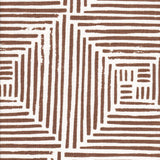 Detail of fabric in a dashed grid print in brown on a white field.