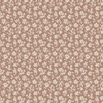 Pattern of small white flowers on a terracotta background