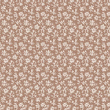 Pattern of small white flowers on a terracotta background