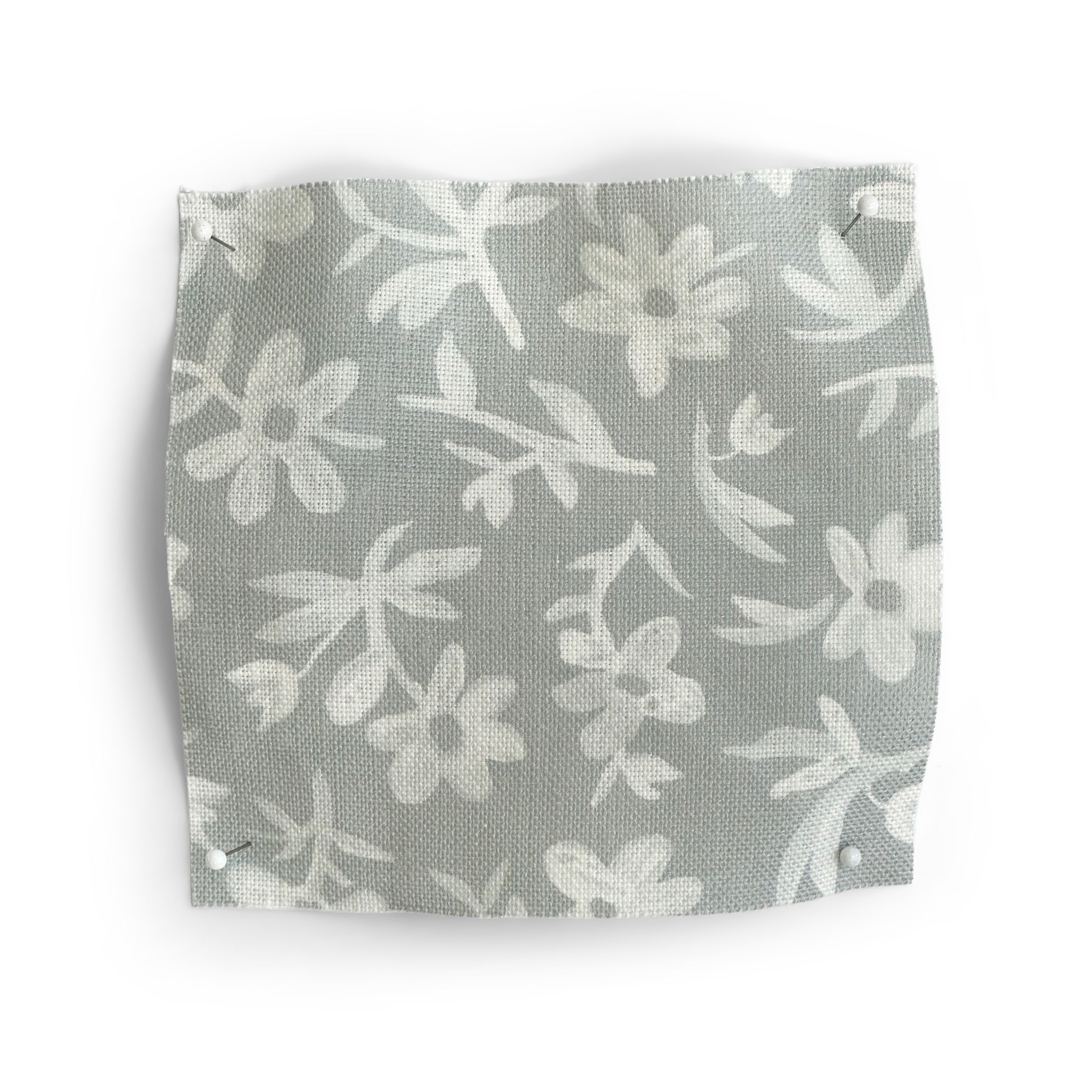 Floral patterned fabric swatch on a gray background