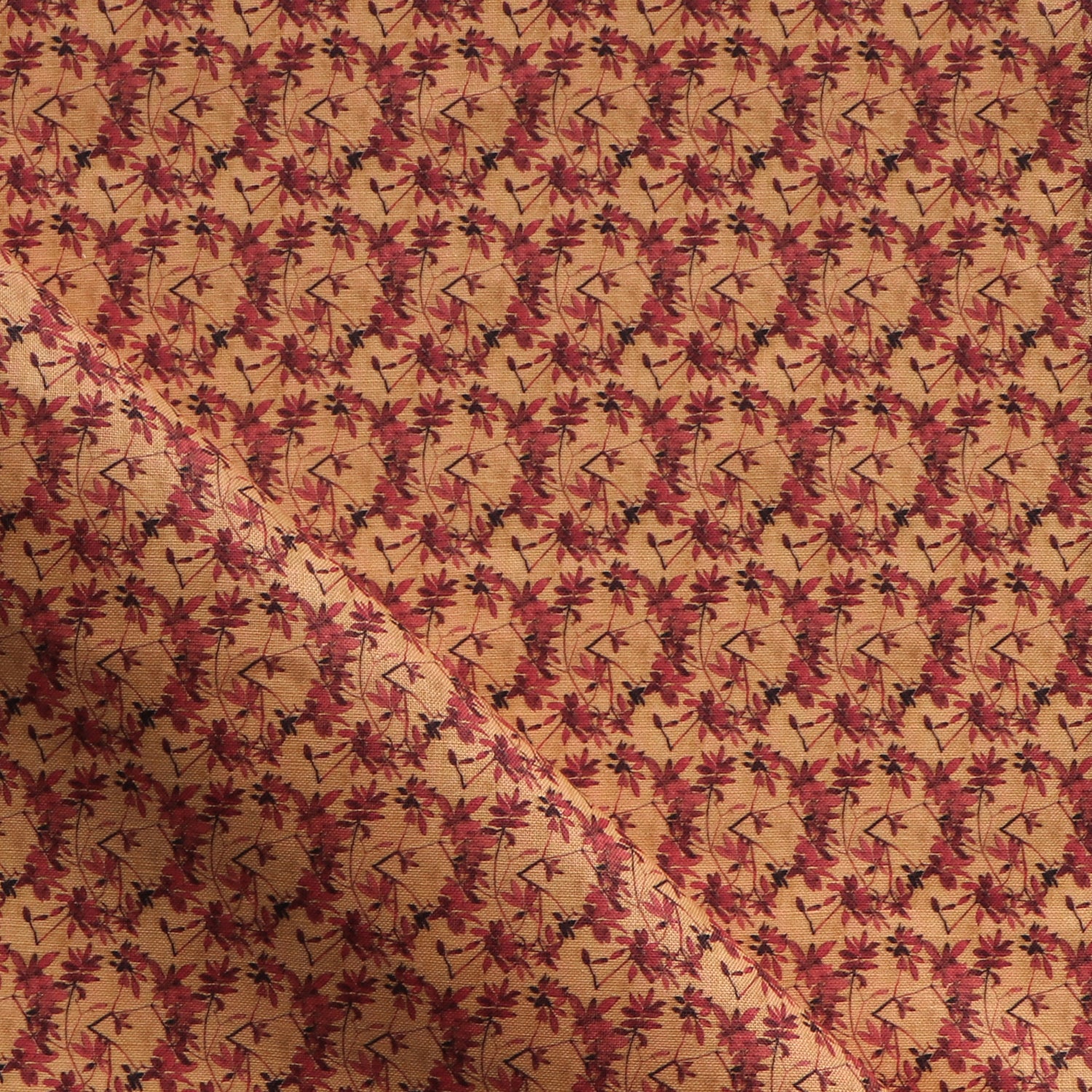 Fabric with small scale watercolor floral in red and orange.