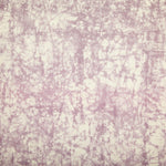 Detail of velvet fabric in an organic crumpled texture in light purple on a cream field.