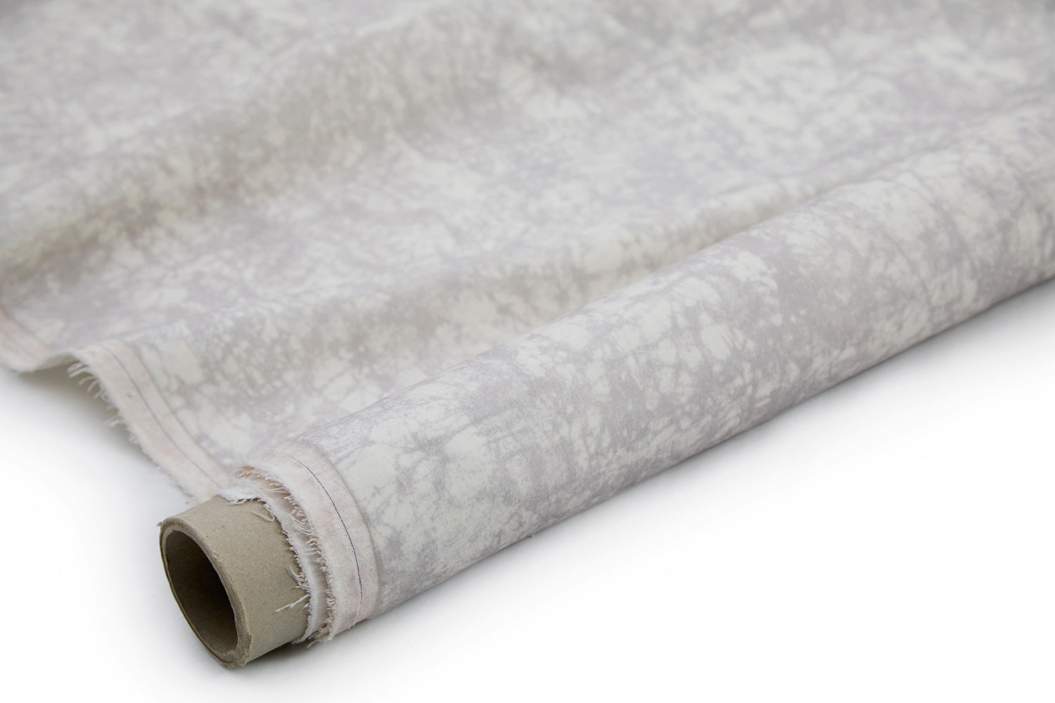 Partially unrolled fabric in an organic crumpled texture in light gray on a cream field.