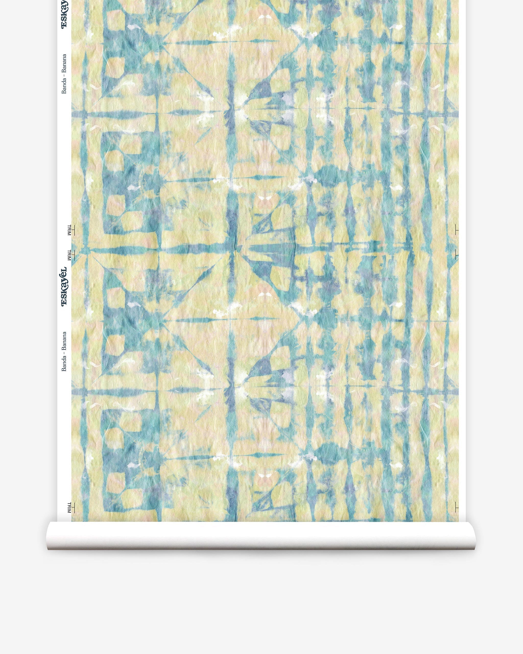 Partially unrolled wallpaper yardage in an abstract dyed grid print in mottled yellow, blue and white.