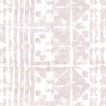 Detail of wallpaper in an abstract dyed grid print in mottled white and pink.