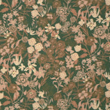 Detail of fabric in a dense small-scale floral print in shades of brown and tan on a green field.