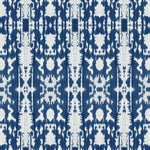 Detail of wallpaper in a painterly ikat print in blue and white.