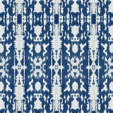 Detail of wallpaper in a painterly ikat print in blue and white.