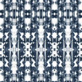 Detail of wallpaper in a painterly ikat print in navy and white.