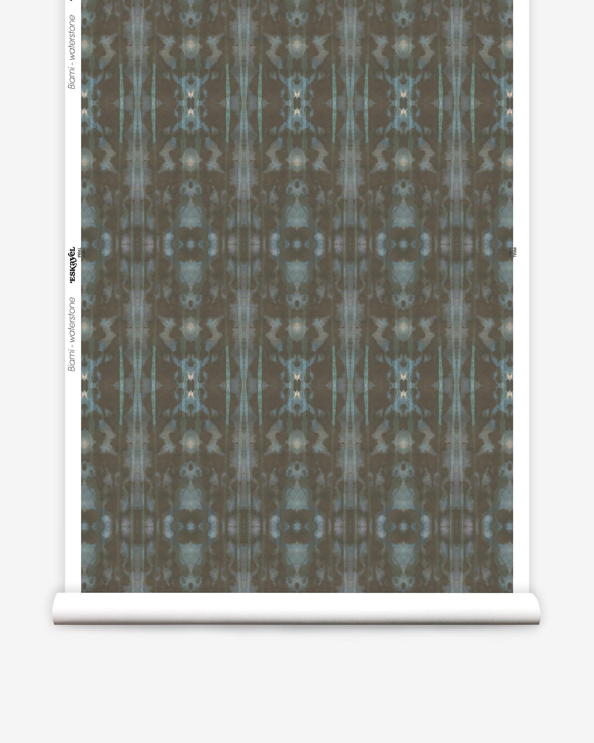 Partially unrolled wallpaper yardage in a painterly ikat print in turquoise and brown.