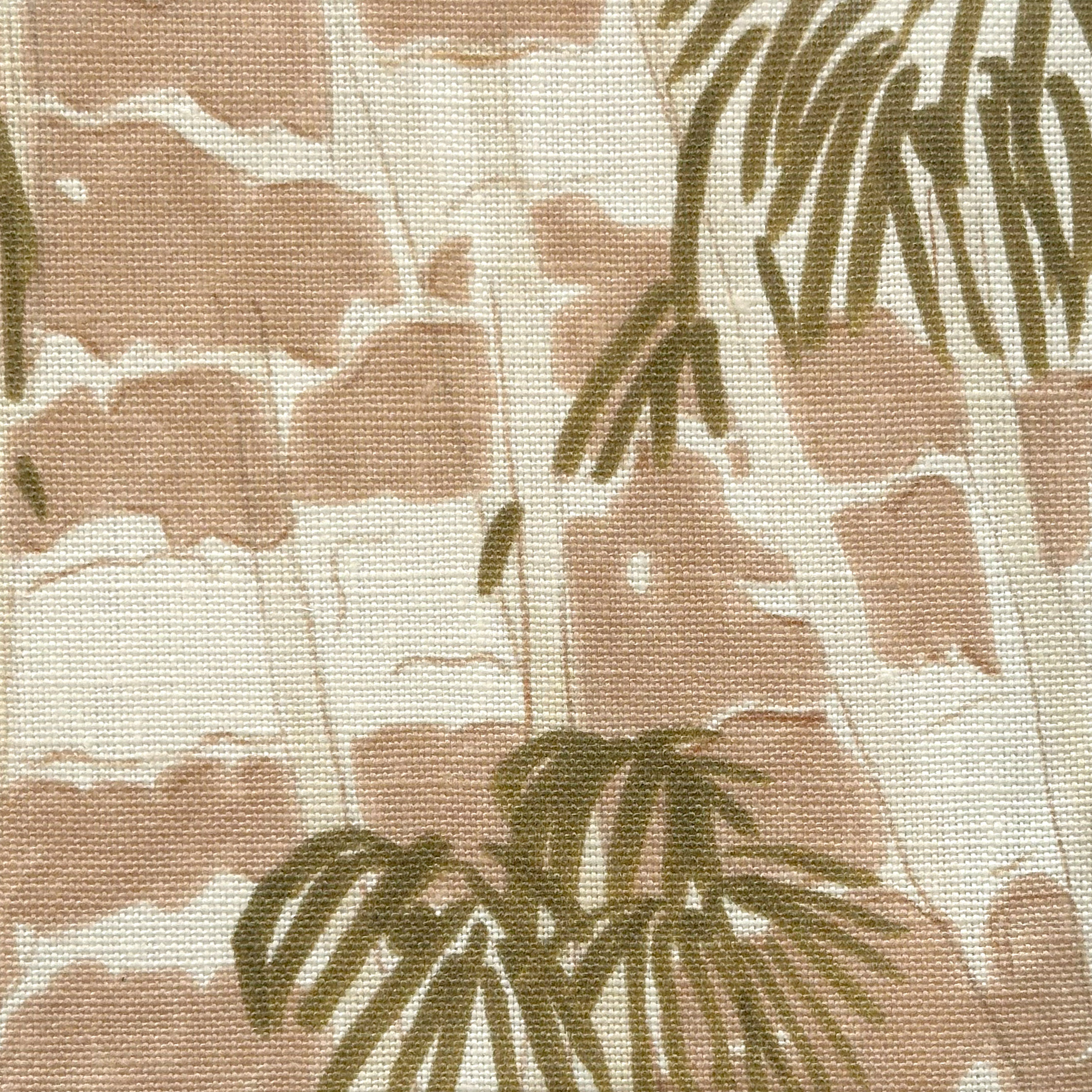 Close-up of fabric in a painterly palm tree print in shades of pink, beige and olive on a white field.