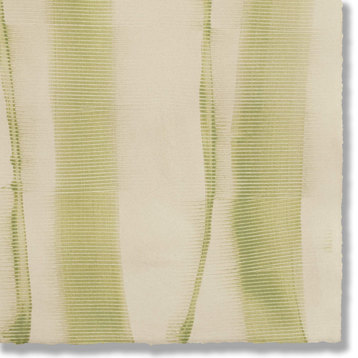 Detail of a handmade wallpaper swatch with an irregular combed stripe pattern in olive on a cream field.