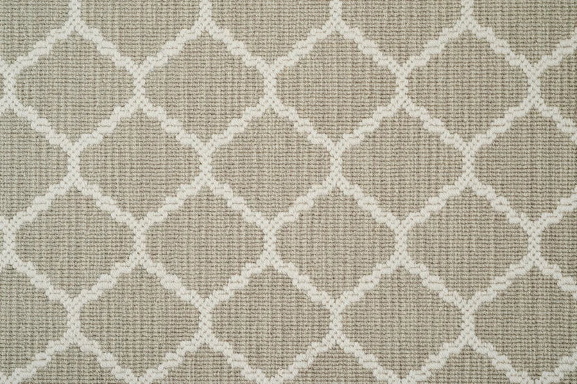 Broadloom carpet swatch in geometric pattern tan color