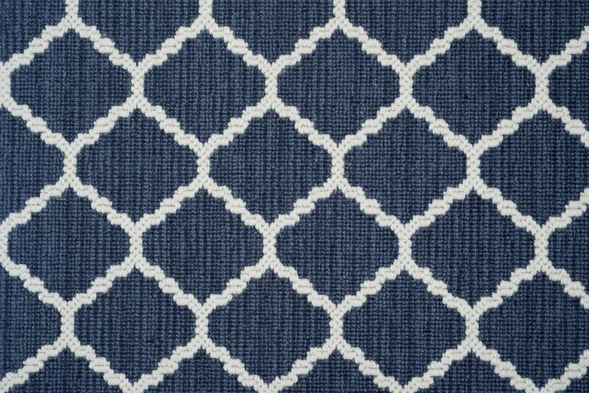 Broadloom carpet swatch in geometric pattern dark blue color