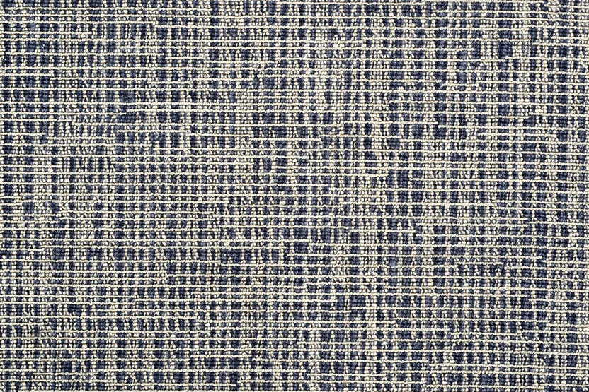 Broadloom carpet swatch in textural pattern dark blue color