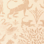 Detail of wallpaper in a lion and plant print in light pink on a white field.