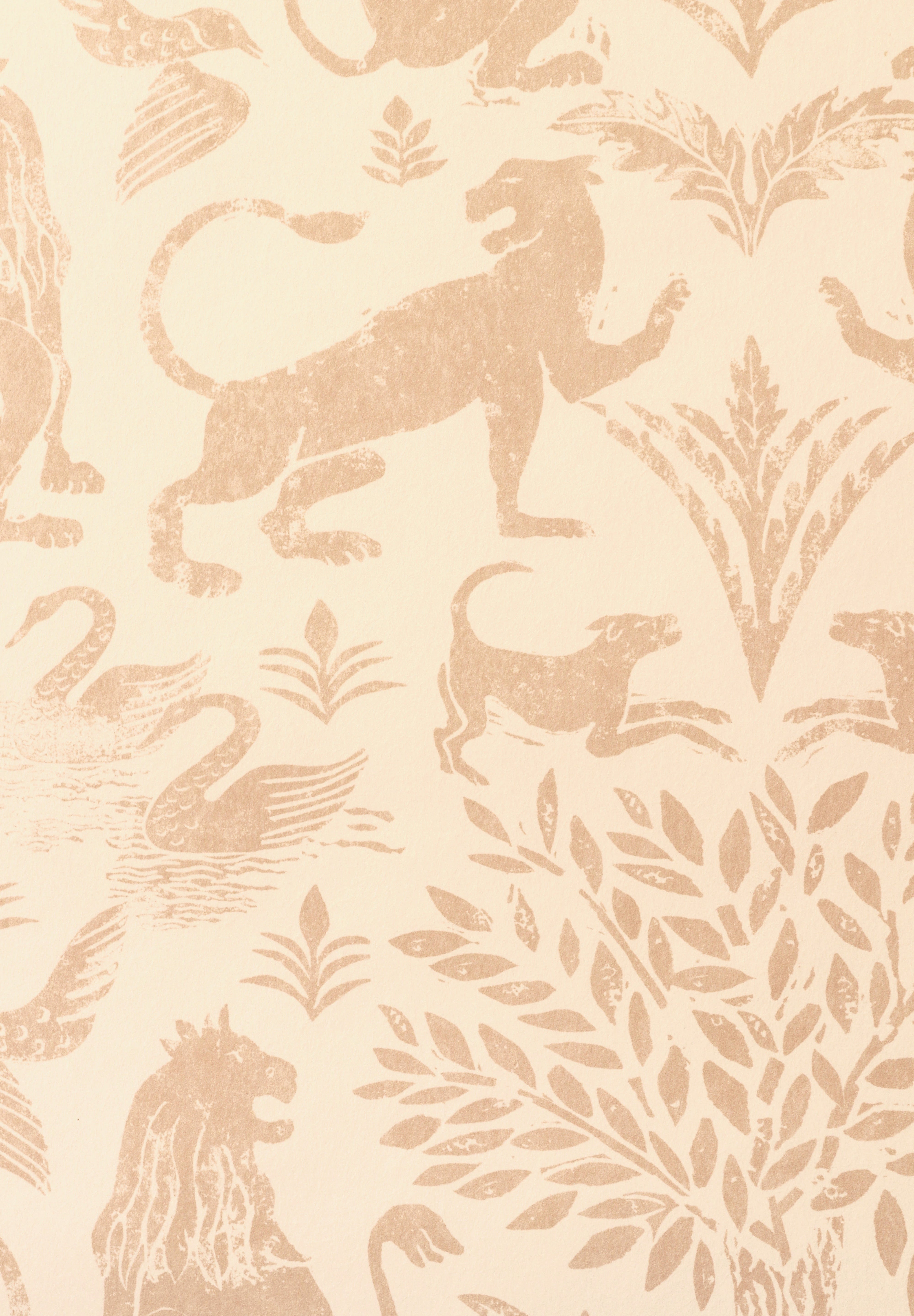 Detail of wallpaper in a lion and plant print in light pink on a white field.