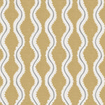 Detail of fabric in a playful curvy stripe print in white and gray on a mustard field.