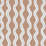 Detail of fabric in a playful curvy stripe print in white and blue on a brown field.