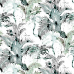 Detail of wallpaper in a painterly palm tree print in shades of gray, green and blue on a white field.