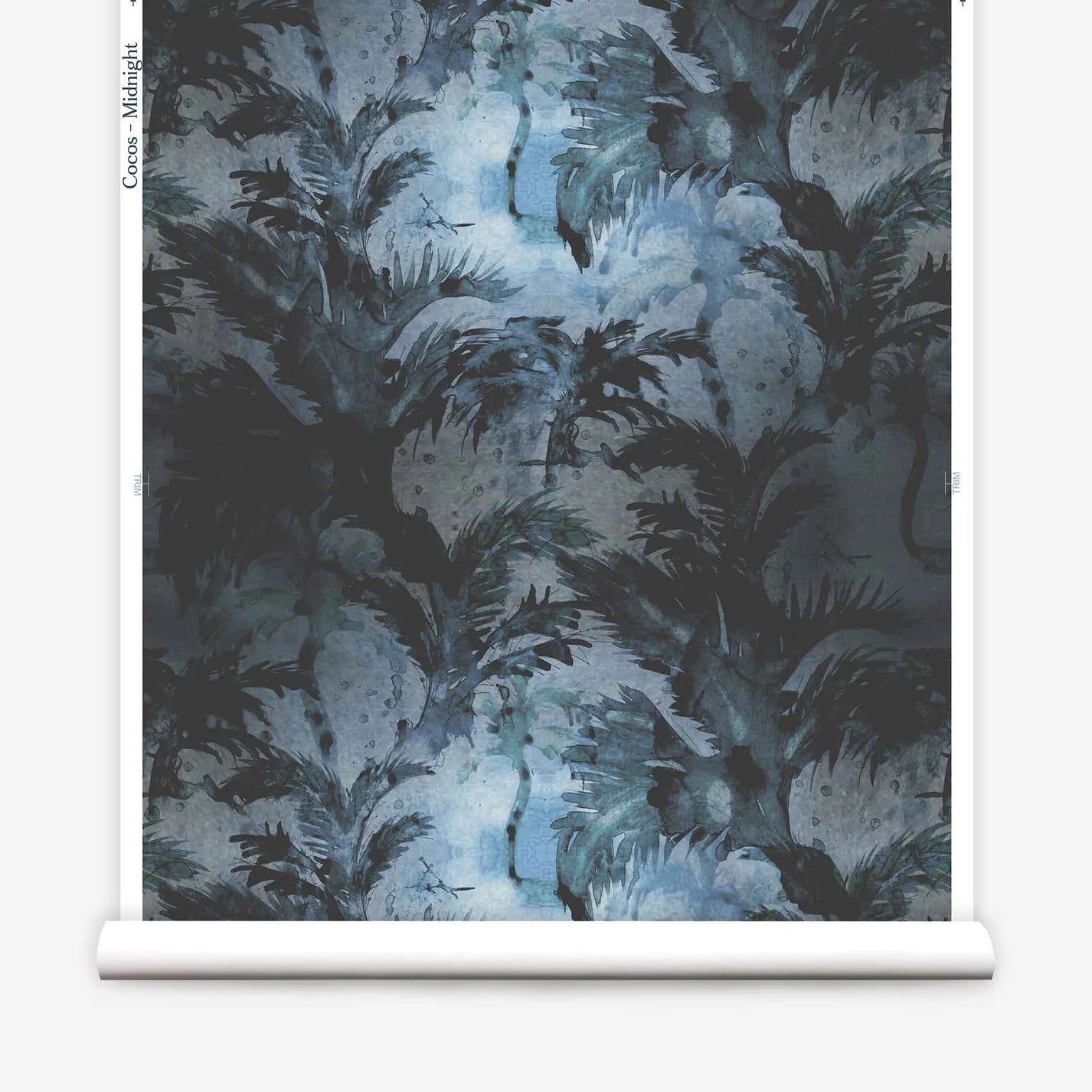 Partially unrolled wallpaper yardage in a painterly palm tree print in shades of gray and blue.