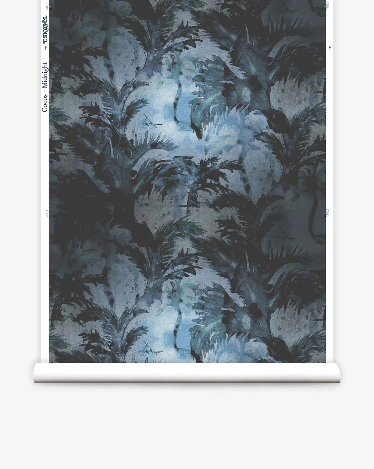 Partially unrolled wallpaper yardage in a painterly palm tree print in shades of gray and blue.