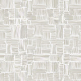 Detail of wallpaper in a directional dash pattern in cream on a white field.