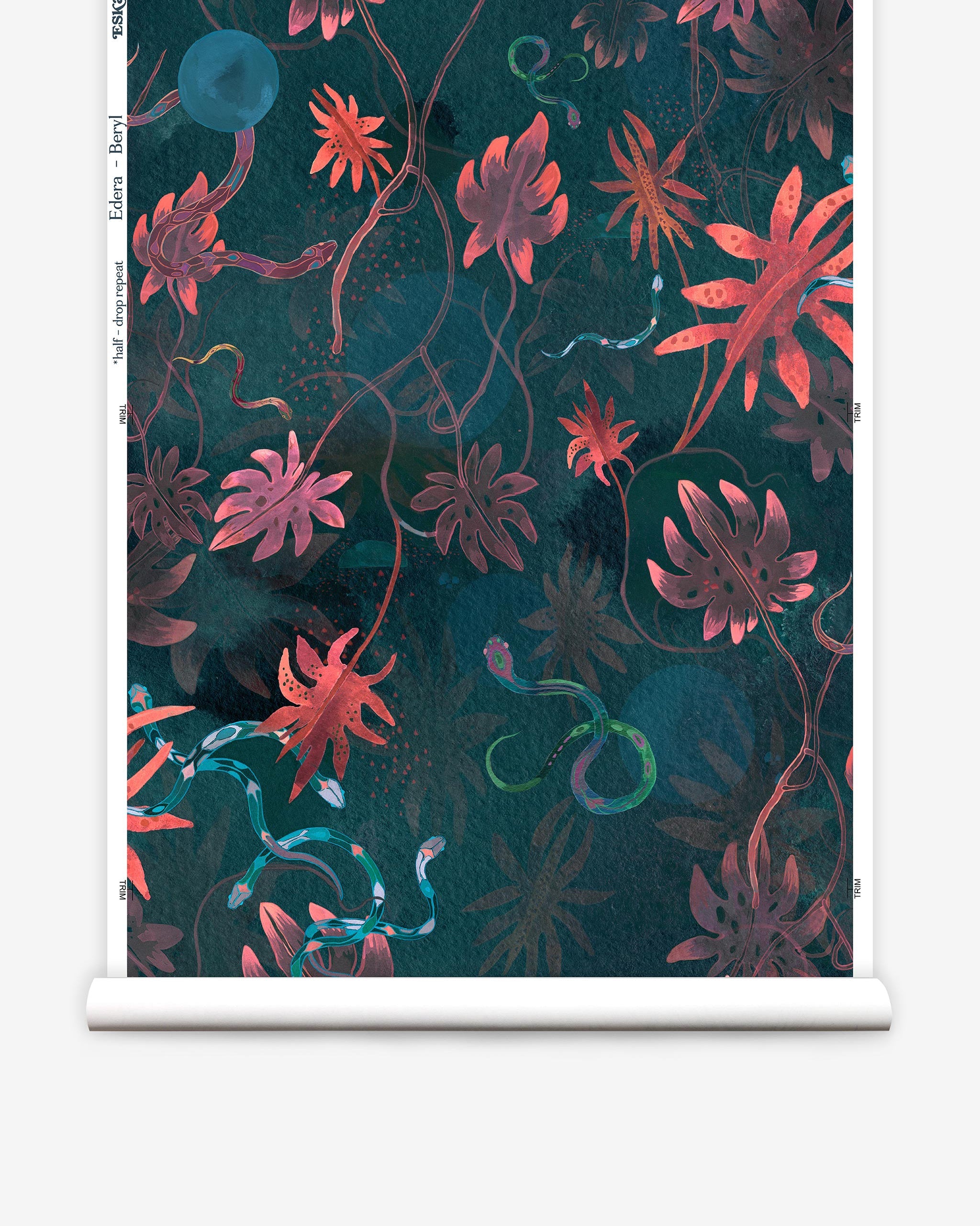 Partially unrolled wallpaper yardage in a playful leaf and snake print in pink, blue, green and dark turquoise.
