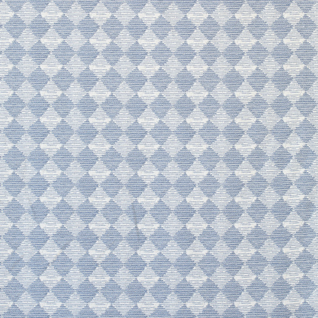 Detail of fabric in a textural diamond print in light blue and white.