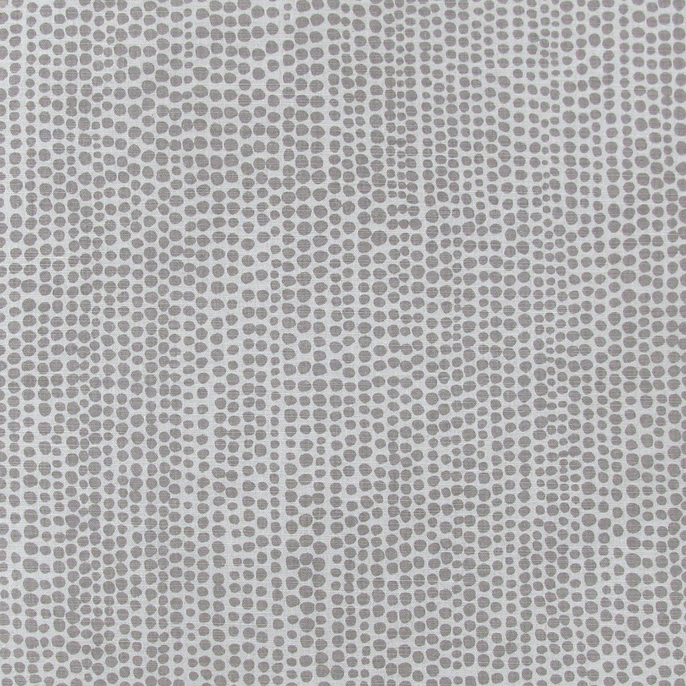 Detail of fabric in a painterly dotted print in gray on a light gray field.
