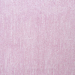 Detail of fabric in a painterly dotted print in purple on a white field.