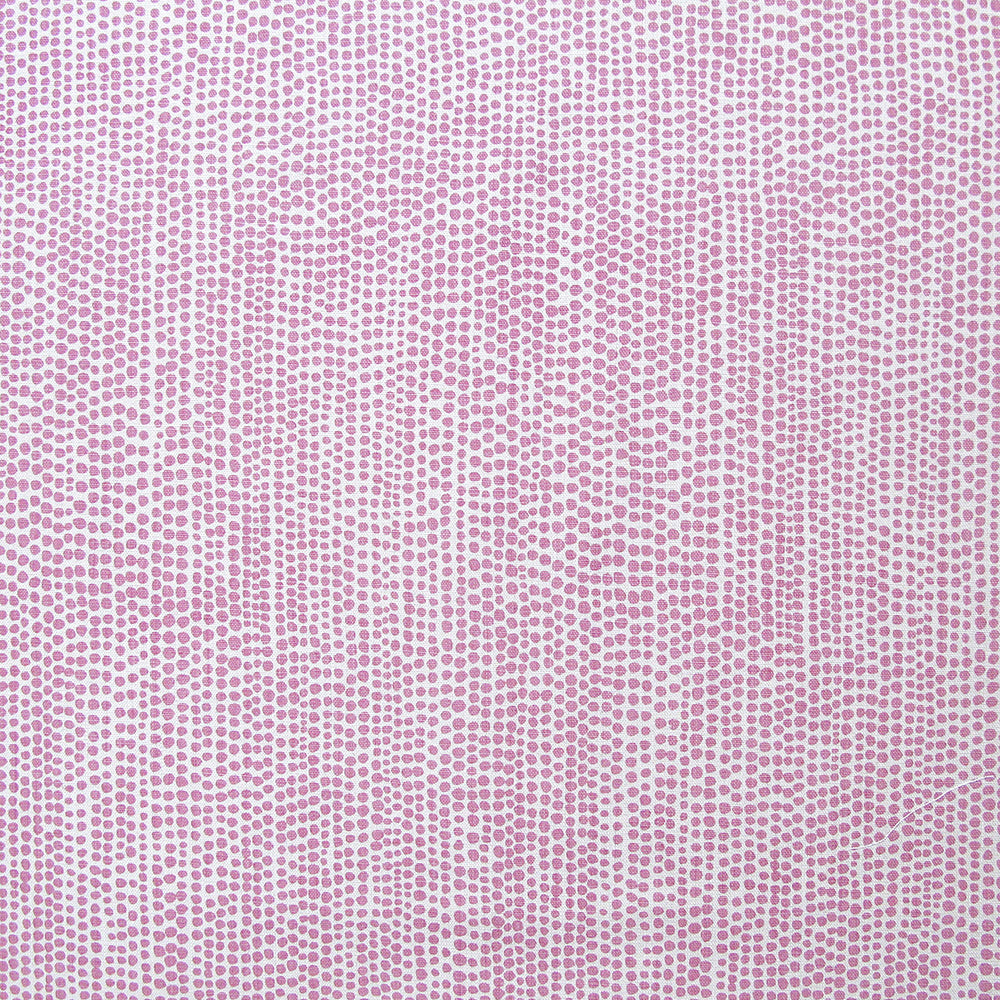 Detail of fabric in a painterly dotted print in light purple on a white field.