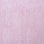 Detail of fabric in a painterly dotted print in light purple on a white field.