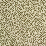 Broadloom carpet swatch in a spots pattern green cream color