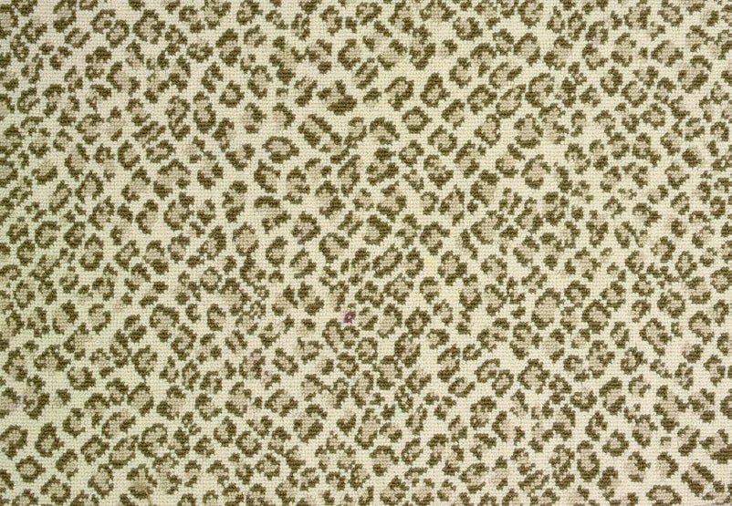 Broadloom carpet swatch in a spots pattern green cream color