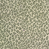 Broadloom carpet swatch in a spots pattern green color