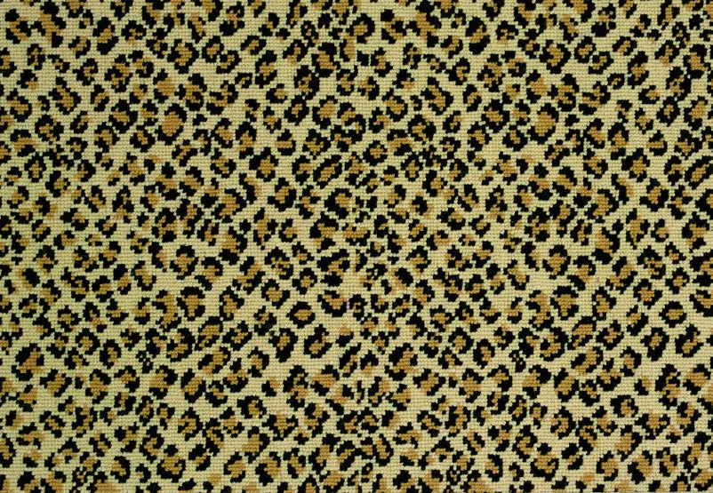 Broadloom carpet swatch in a spots pattern yellow tan color