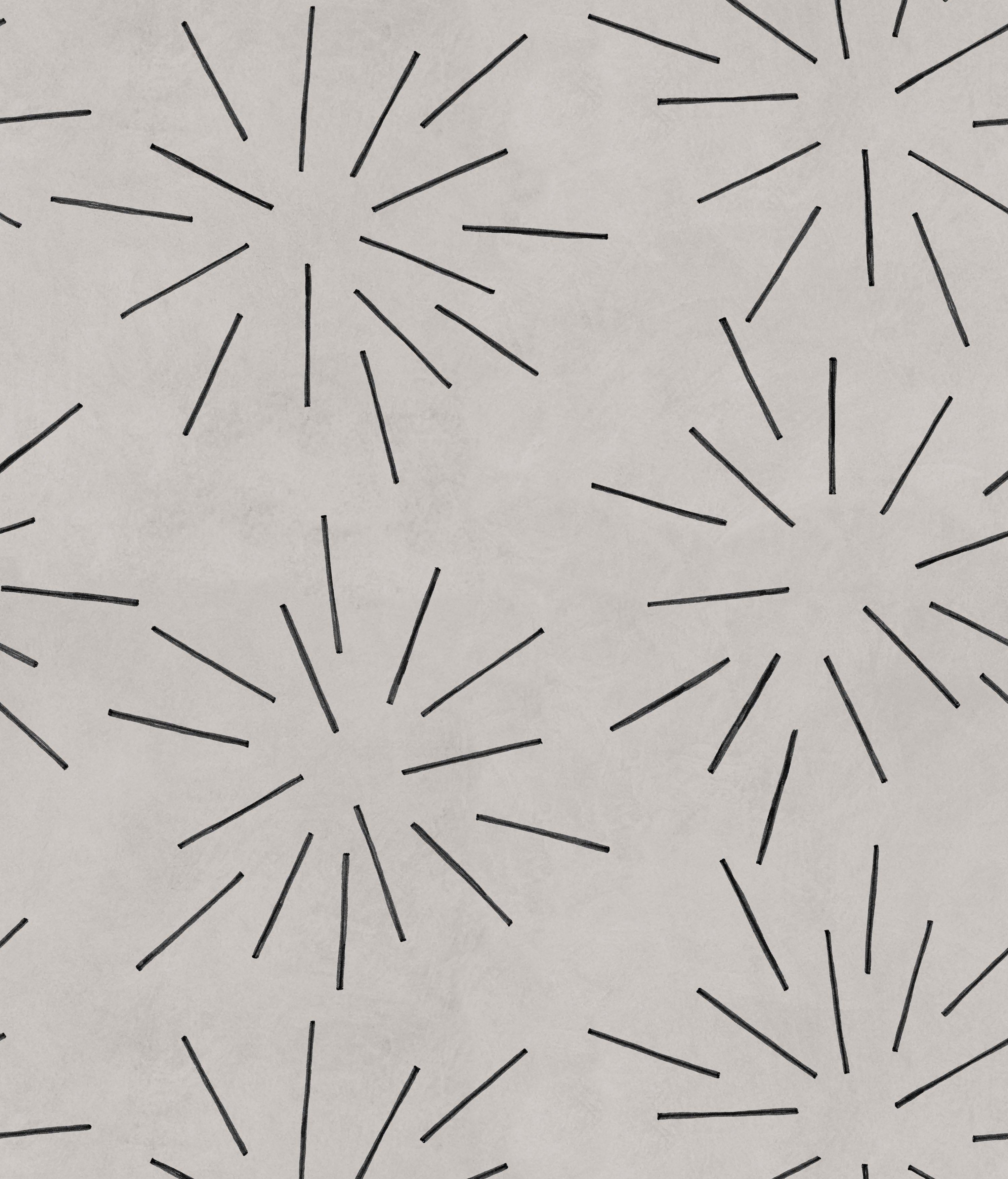 Detail of wallpaper in a playful firework print in black on a greige field.