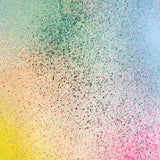 Detail of fabric in an abstract ombré paint splatter print in shades of yellow, pink, green and blue.