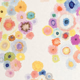 Detail of wallpaper in a painterly floral print in multicolor pastels on a white field.