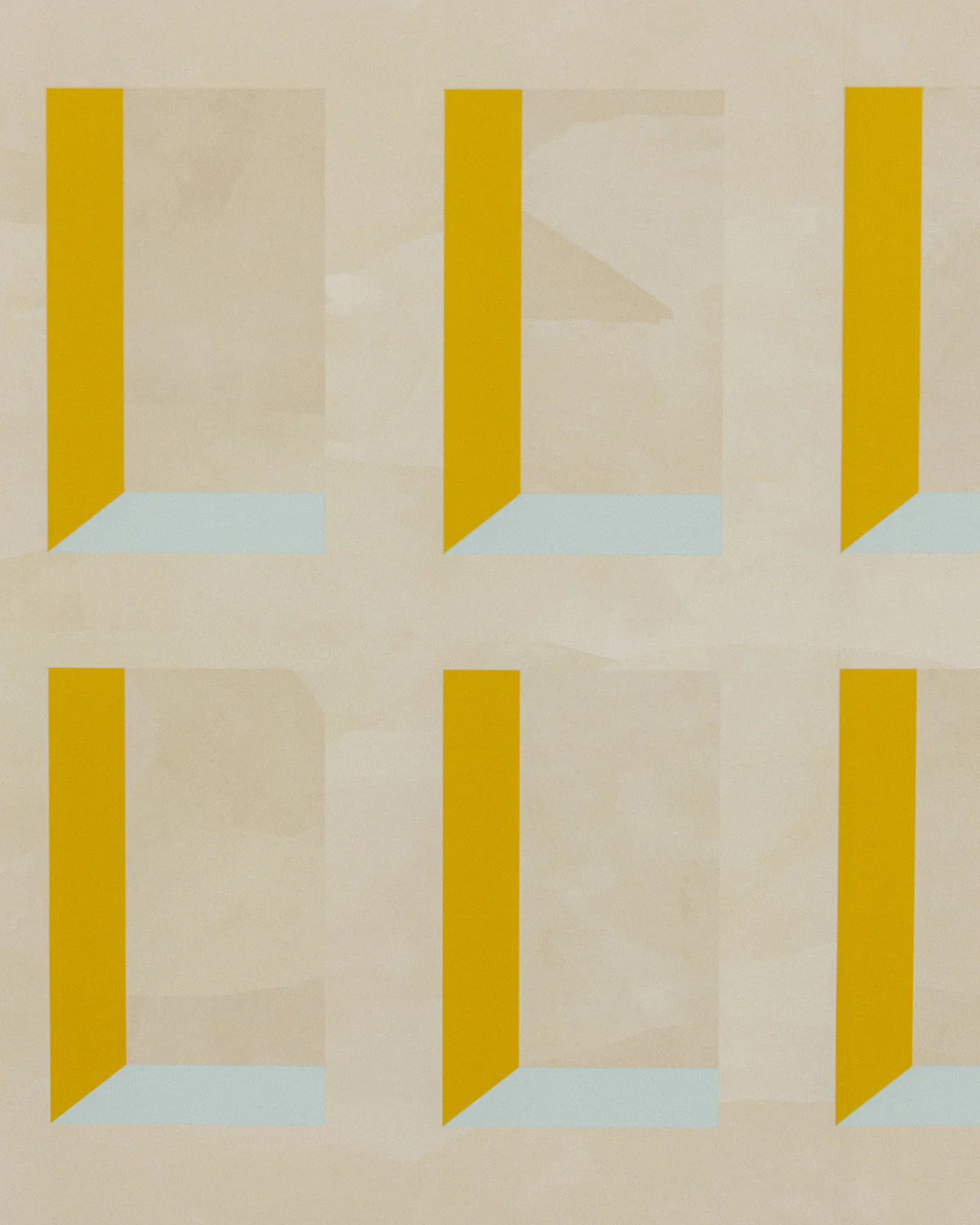 Detail of wallpaper in a dimensional grid print in shades of cream, light blue and yellow.